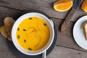 Vegetarian pumpkin orange soup with ginger