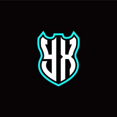 Obraz premium Y X initial logo design with shield shape