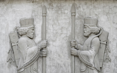Achaemenid soldiers reliefs on concrete wall, Tehran, Iran