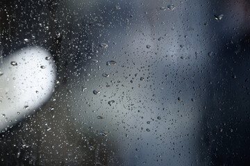 Drops of water perched on my window glass