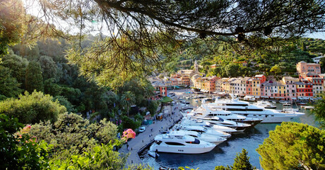Beautiful Portofino cityscape, best touristic Mediterranean place with typical colorful buildings...