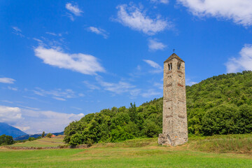 the solitary medieval stone bell tower of Saint Martin called "The Ciucarun"/It is the only remaining  remnant of the ancient village of Paerno demolished in the 1250s,in Bollengo,Italy