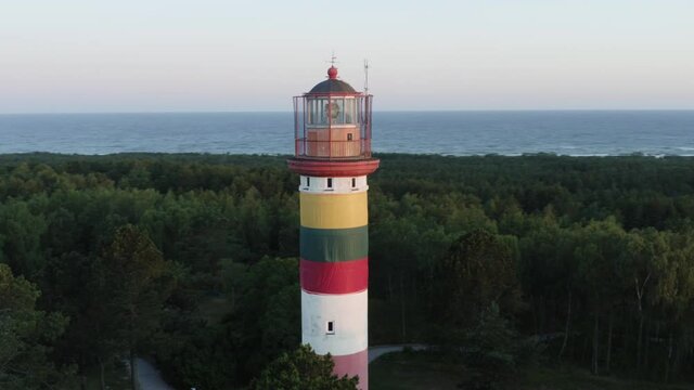 Lithuanian national flag on lighthouse in Nida, Lithuania.