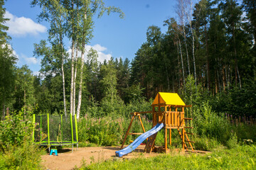 children playground in the forest 