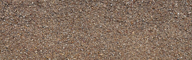 Coarse-grained sand on the river beach.