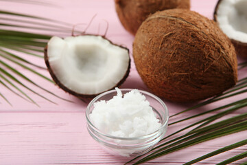 coconut oil and coconuts on the table
