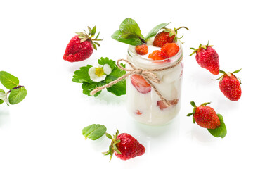 sweet homemade yogurt with ripe fresh strawberries in a jar
