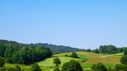 Obraz premium Hills, fields and meadows - beautiful landscape of Wiezyca.