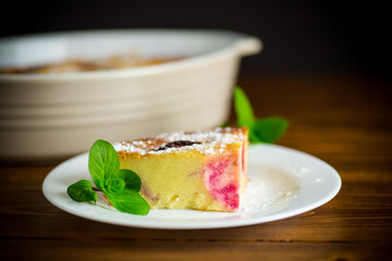 sweet homemade casserole with fruits inside in a plate