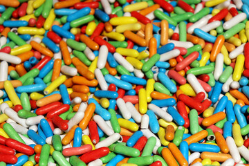 Colorful candy, selective focus. Red, green, blue, white and yellow sweets, pile of fruit candies for background, candy texture