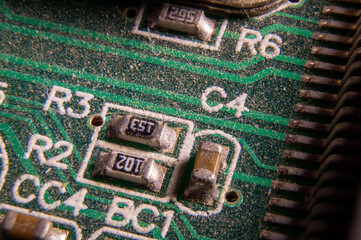 dusty printed circuit Board with components . macro