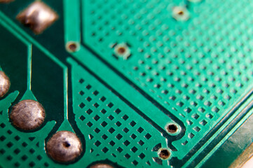 dusty printed circuit Board with components . macro selective focus