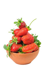 Group of fresh strawberries in the clay bowl, white background
