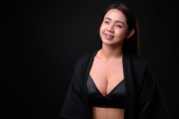 Portrait of happy young beautiful Asian transgender woman