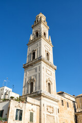 Fototapeta na wymiar The cathedral bell tower in the city of Lecce in the Apulia region of Italy. The cathedral is dedicated to the Assumption of the Virgin Mary.