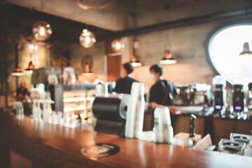 Blur coffee shop or cafe restaurant with abstract bokeh light image background.For montage product...