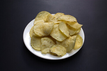 Delicious chips on a plate.
