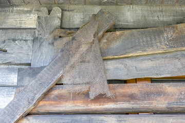 Wall in the garden made of natural wooden boards