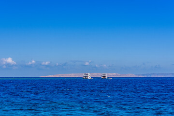 White yachts in Red sea not far from the Hurghada city, Egypt