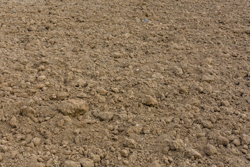 Background of the plowed field prepared for sowing