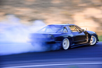 Obraz na płótnie Canvas Car race. High-speed track. Smoke