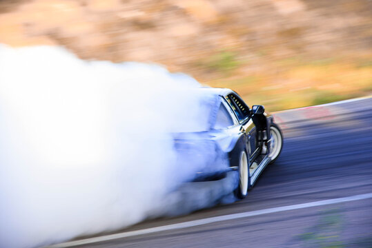 Car race. High-speed track. Smoke © Марина Конторская