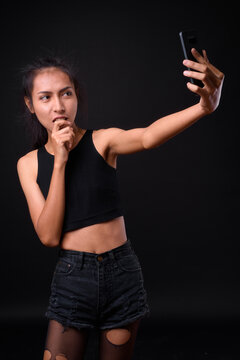 Young Beautiful Asian Transgender Woman Taking Selfie