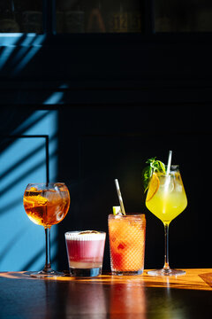 Row of various alcohol drinks on table