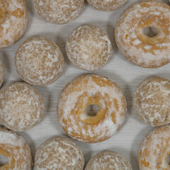Sweet gingerbread cookies with donuts in sugar glaze.