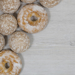 Sweet gingerbread cookies with donuts in sugar glaze.