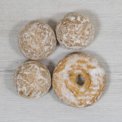 Sweet gingerbread cookies with donuts in sugar glaze.
