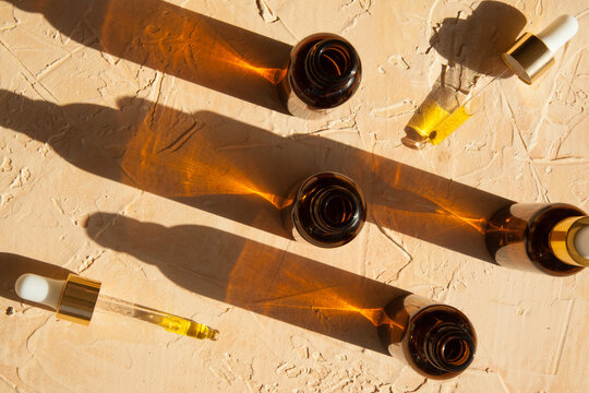 CBD/Essential oil bottles and droppers in sunlight