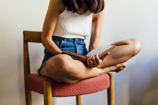 Girl reading a book.