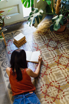 Girl reading a book.