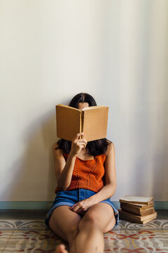 Girl reading a book.