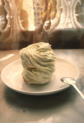 background with delicious light green  marshmallows close-up in gentle tones