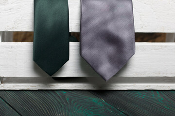 Two men's ties in different colors and sizes. For father and son. Love and Togetherness Objects.