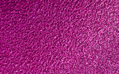 Pink metallic foil paper texture background.