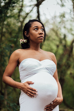 Pregnant in white dress