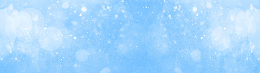 snowflakes isolated on blue sky - winter weather snow background panorama banner long	
