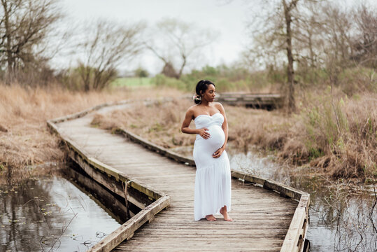 Pregnant in white dress