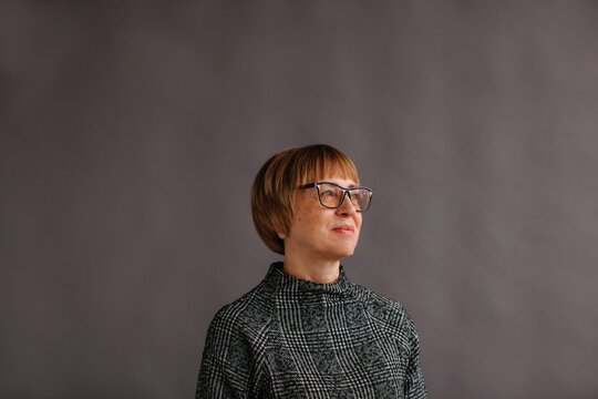 Elegant mature lady in glasses