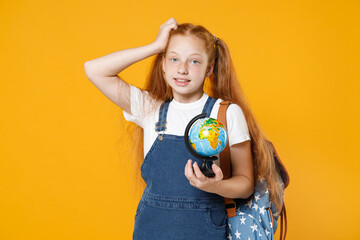 Confused redhead school teen kid girl 12-13 years old in white tshirt backpack hold in hand globe...