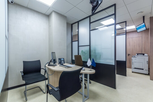 Workplace Close View, With The Computer, Telephone On Desk. Modern Sales Office With A Copy Machine