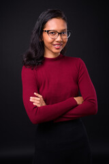 Obraz premium Portrait of happy young beautiful Asian businesswoman
