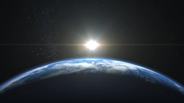 Sunrise over the Earth. View from space. The earth rotates towards the sun. The camera flies towards the Earth. Realistic atmosphere. Volumetric clouds. Starry sky. 4K. 3D animation. Stars twinkle.