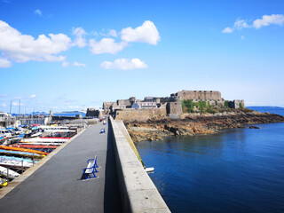 Fototapeta na wymiar Castle Cornet in Guernsey is located along the breakwater in the town of St Peter's Port. 