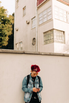 Real Lesbian Woman with red hairs using her phone