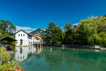 Fototapeta na wymiar Urban landscape river,buildings and architecture of Annecy old town.Annecy is a large French city in the department Haute-Savoie on the river le Thiou and lake Annecy.