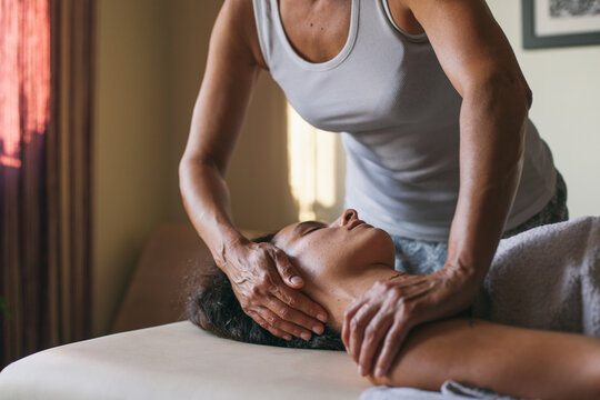 Woman having facial massage